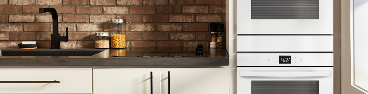 A kitchen featuring a Whirlpool double oven