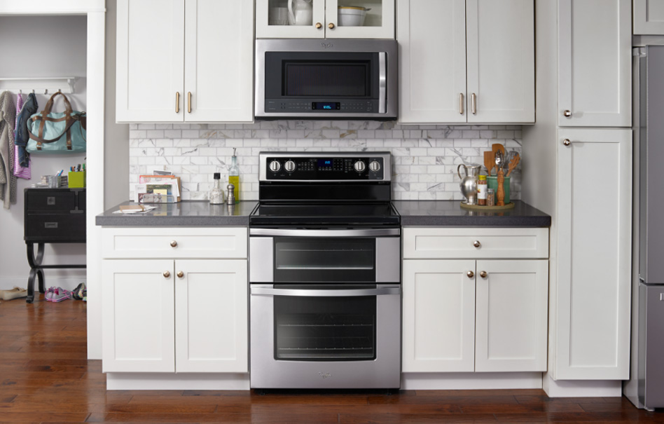 Whirlpool Combination Microwave A modern kitchen featuring various stainless steel appliances