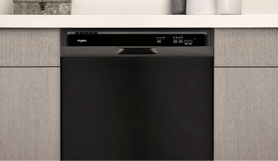 An up-close image of a black Whirlpool dishwasher.