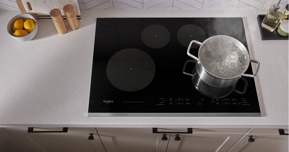A pot of boiling water on a Whirlpool ceramic glass cooktop
