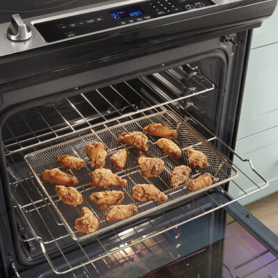 Chicken wings baking inside the oven