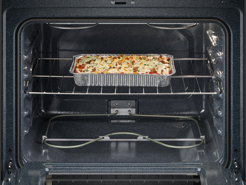 A Whirlpool® Oven with lasagna baking inside A Whirlpool® Oven with lasagna baking inside