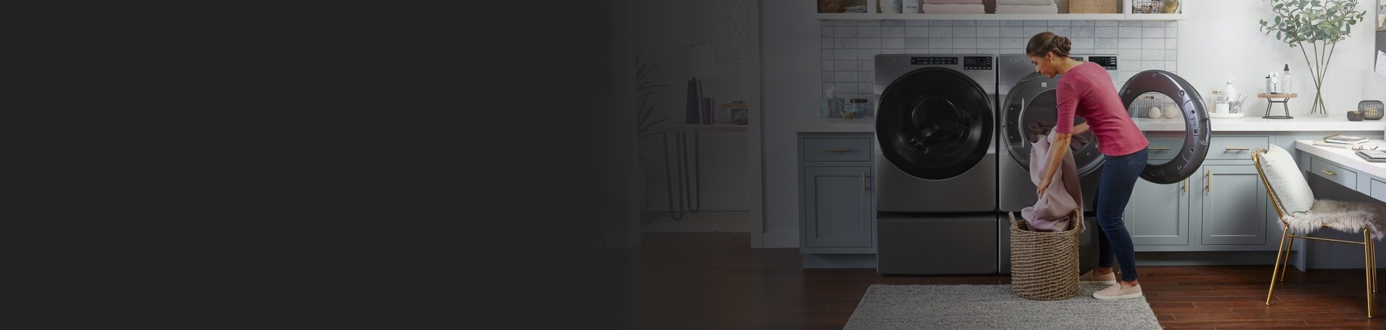 Person unloading laundry from a Whirlpool® dryer