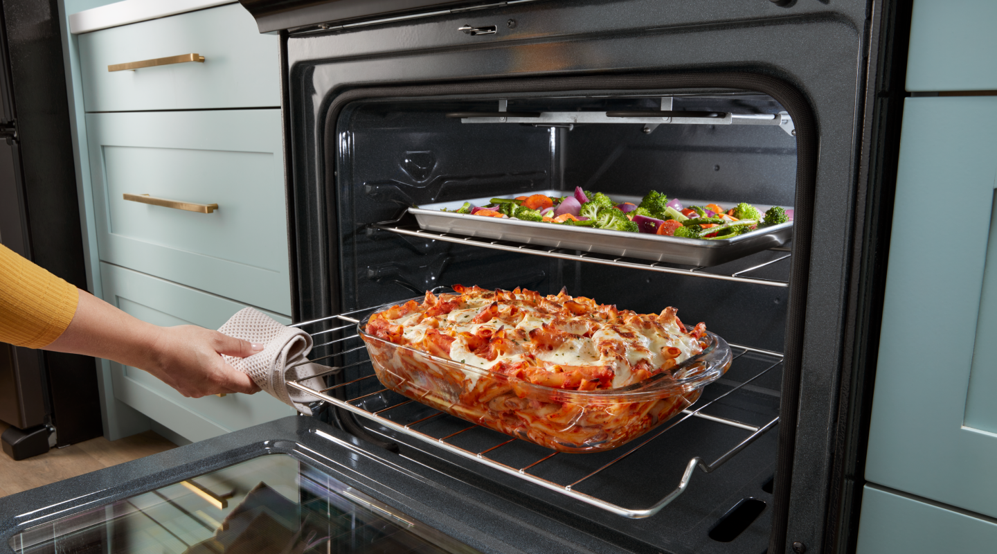 Baked pasta and roasted vegetables inside a Whirlpool® oven Baked pasta and roasted vegetables inside a Whirlpool® oven