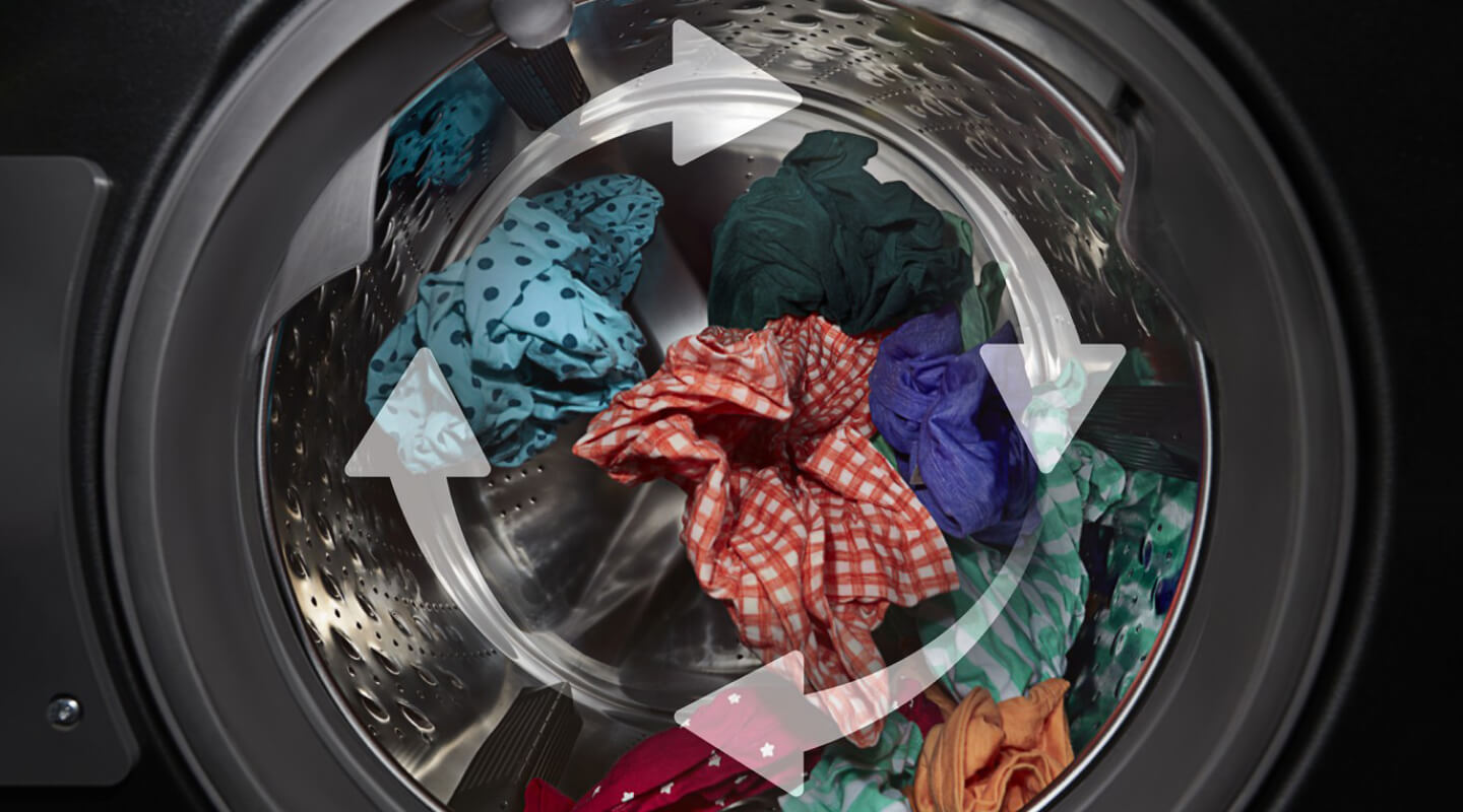 Open washer with arrows showing tumbling action