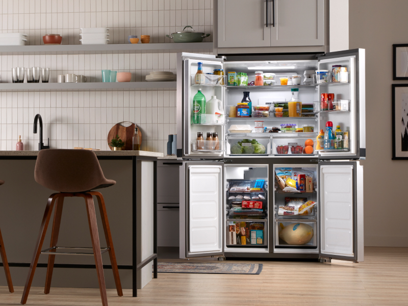 Four doors open on a refrigerator Four doors open on a refrigerator