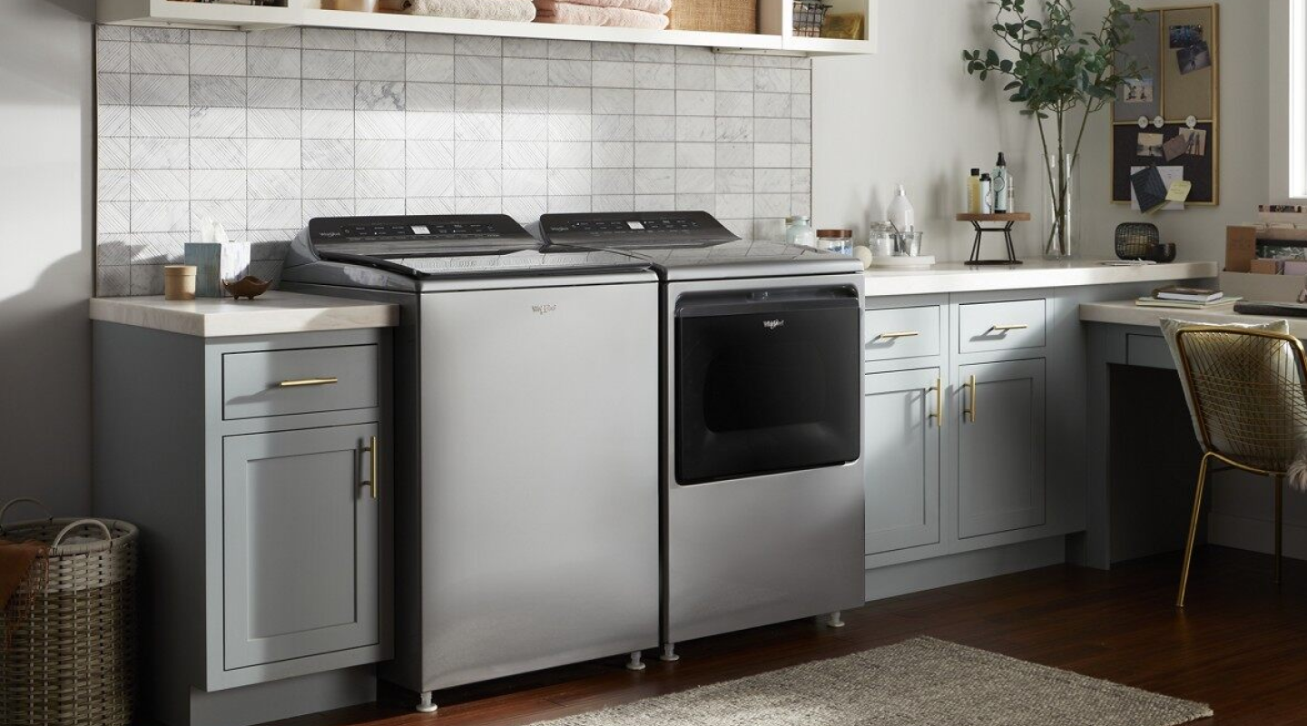 Kitchen with Whirlpool®  6.0 - 6.1 cu. ft. I.E.C. Top Load Washer with 2 in 1 Removable Agitator and 7.4 cu. ft. Top Load Gas Dryer with Advanced Moisture Sensing
