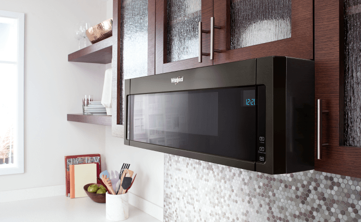 A low profile microwave hood combination A low profile microwave hood combination