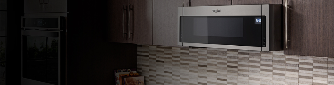 A microwave above a range