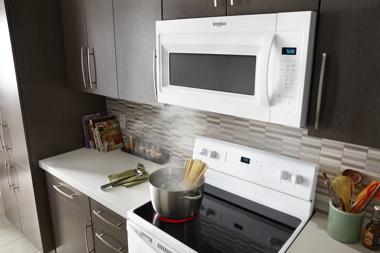 A white, over-the-range microwave. A white, over-the-range microwave.