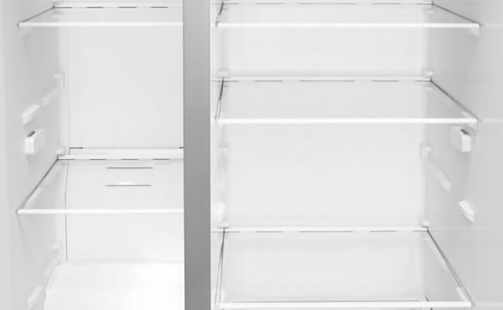 Inside of an empty, clean refrigerator. Inside of an empty, clean refrigerator.
