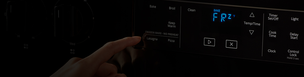 Someone pressing the broil function on their Whirlpool range