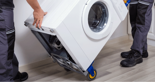 Two men removing an appliance from a home. 