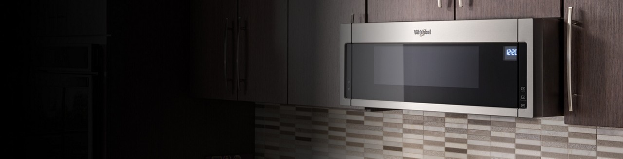 Microwave on top-level cabinets