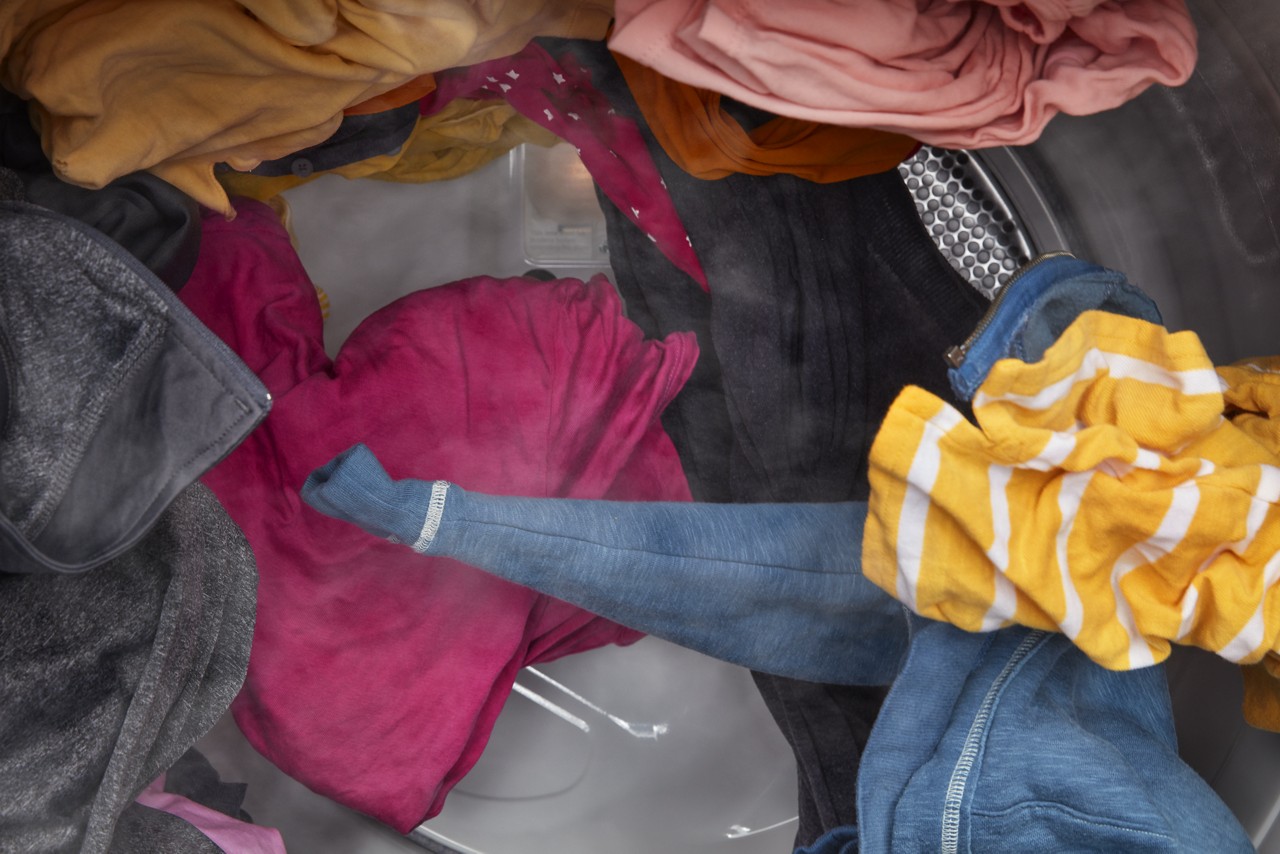 Clothes tumble in a dryer. Clothes tumble in a dryer.