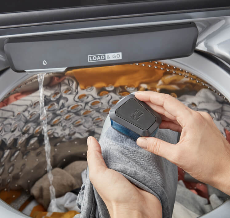 Washer with a built-in water faucet