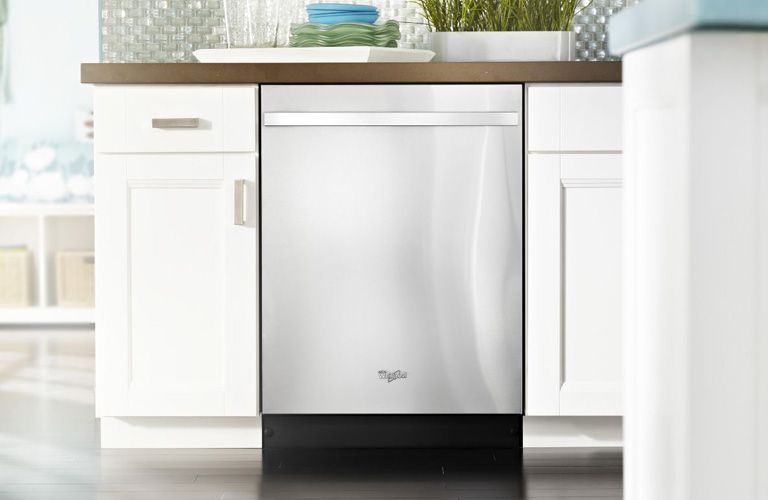 Whirlpool dishwasher in kitchen suit 