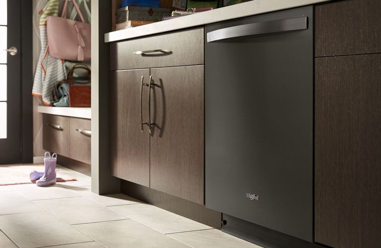 Whirlpool dishwasher in kitchen suit 