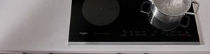 Induction clearance cooking appliances