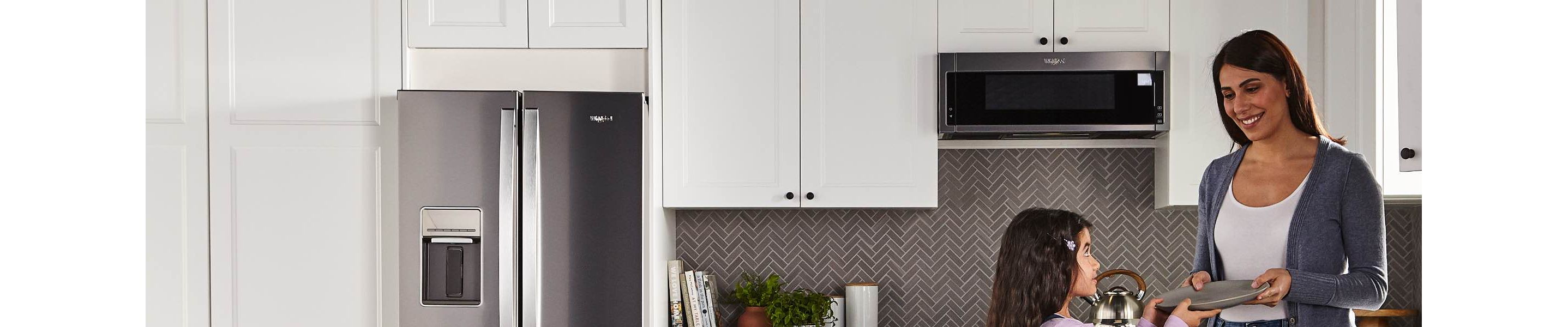 Kitchen featuring a combination microwave