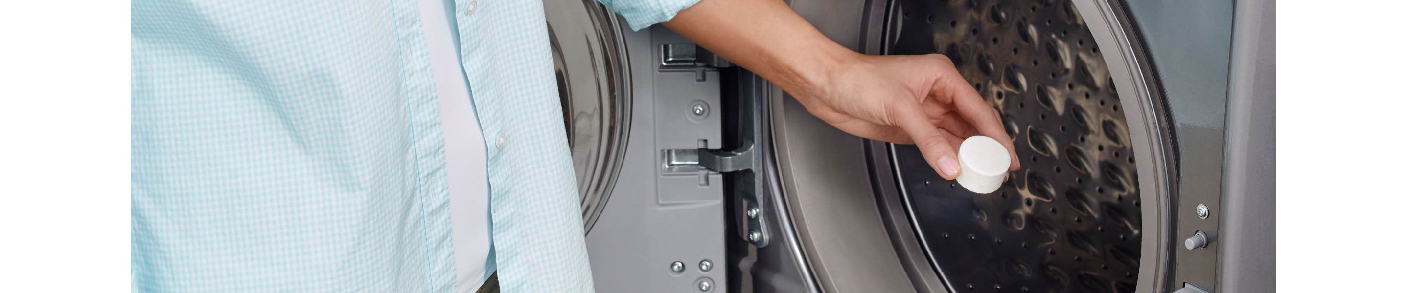 Women cleaning Whirlpool washing machine