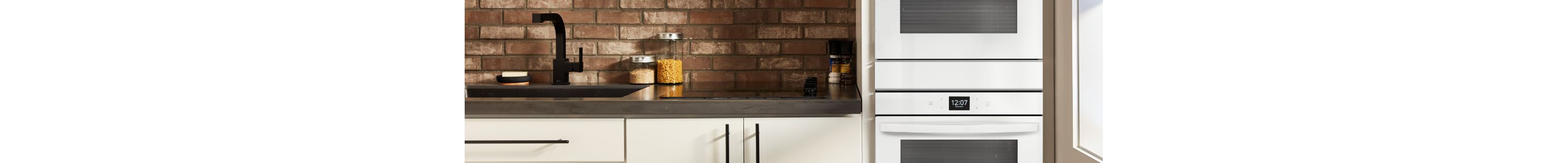 A kitchen featuring a Whirlpool double oven