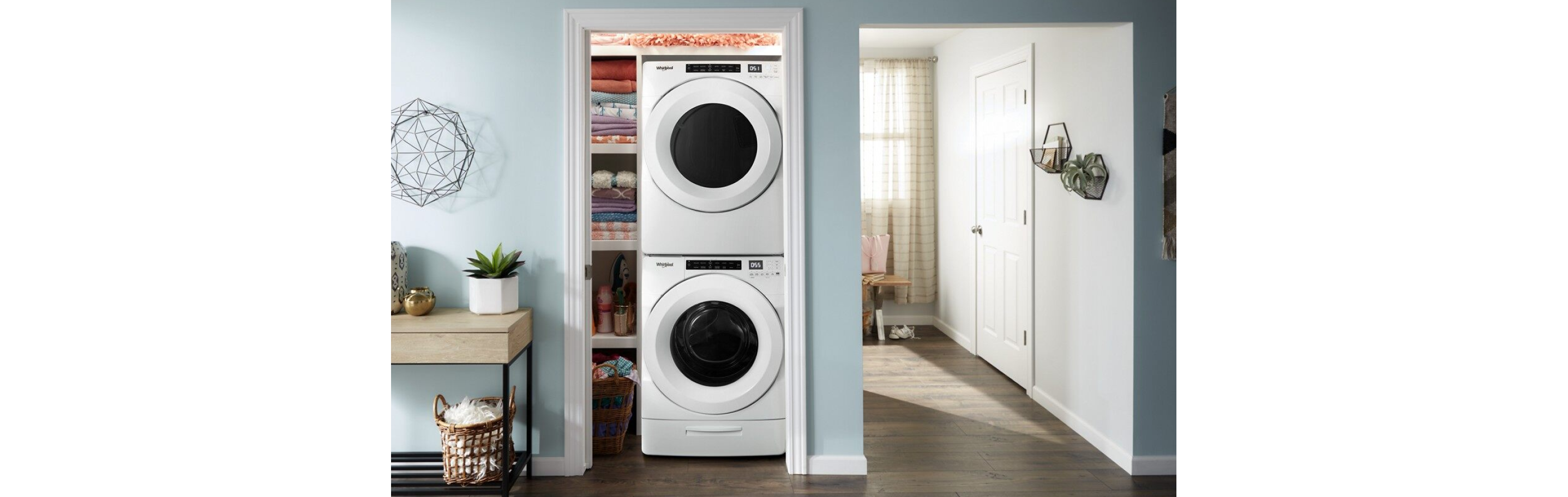 Stacked white Whirlpool® washer and dryer set