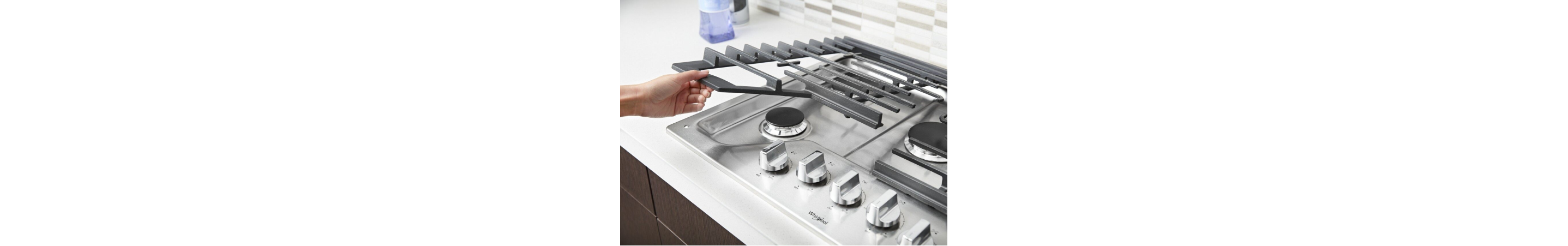 Hand lifting cooktop grate