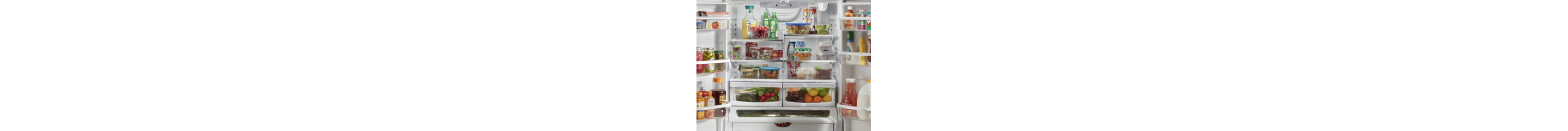 Open French door refrigerator filled with food