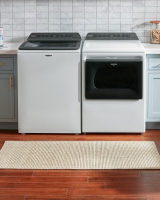  A white Whirlpool®. Washer and Dryer
